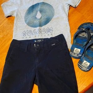 Hurley shorts, Volcan shirt, flip flops
